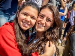 Photo of two students posing together for portrait photo.